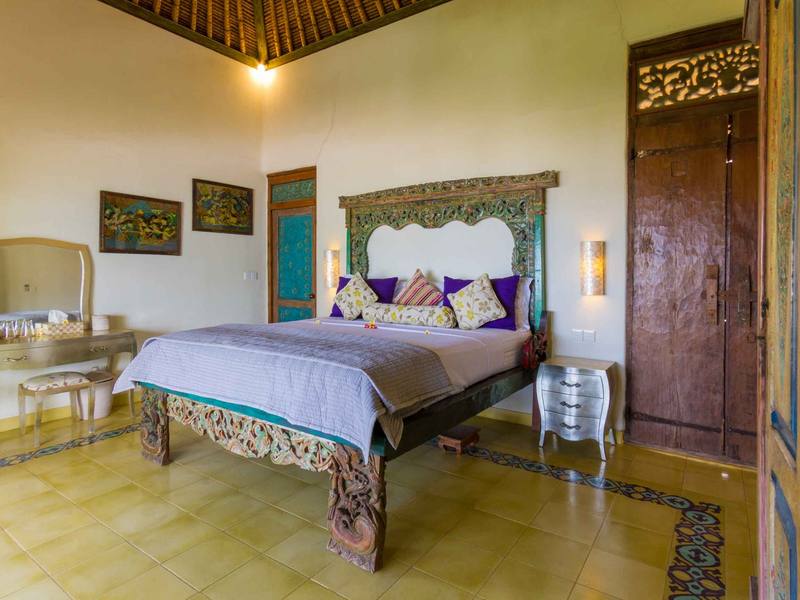 The Passion Flower Suite with antique carved king-size bed